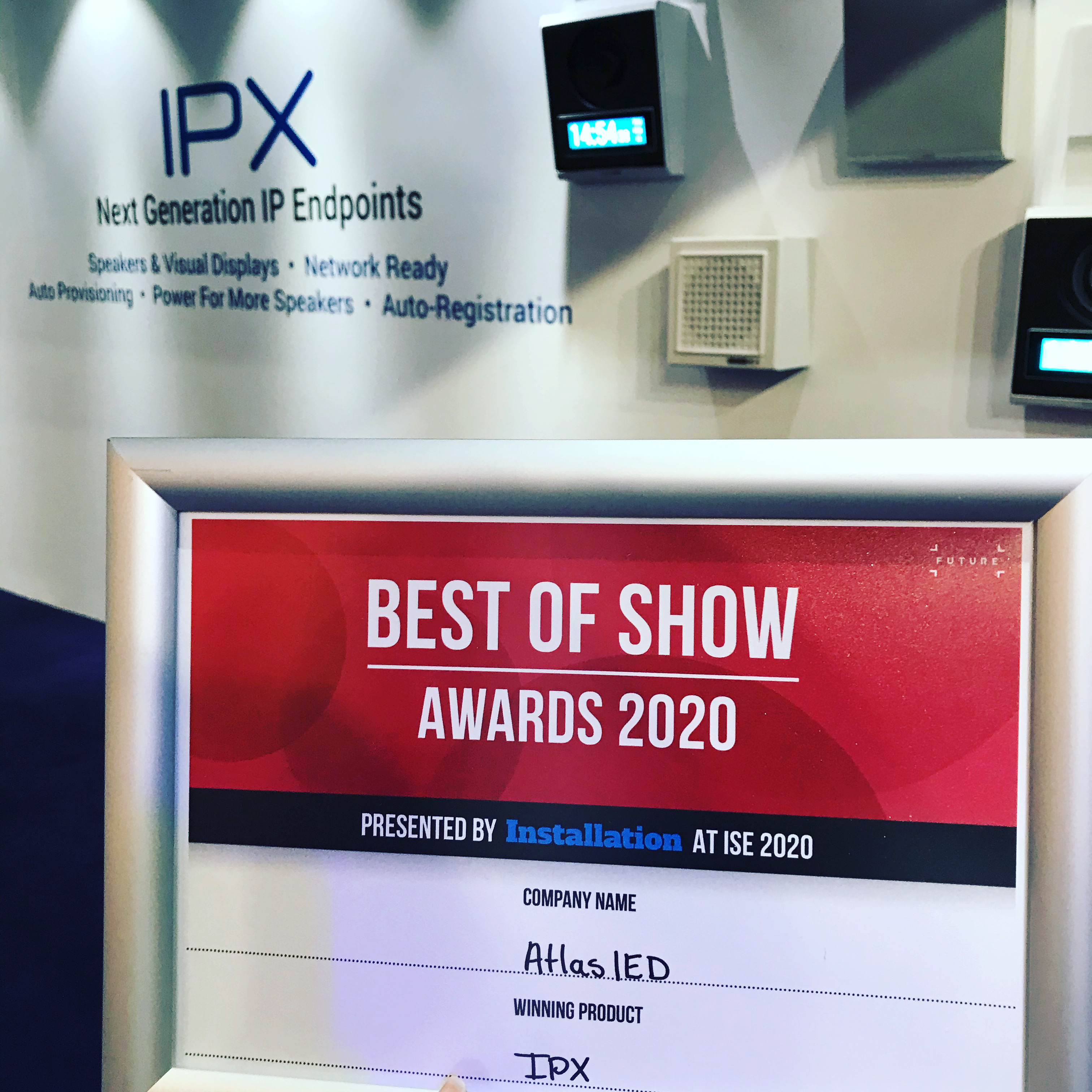 Best of show awards 2020 signage with AtlasIED IPX IP endpoints words, speakers on the wall